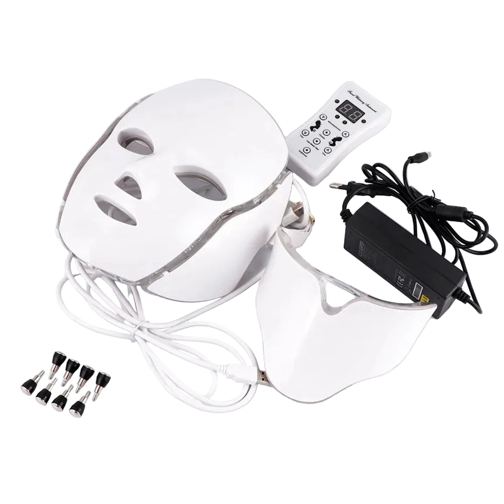 White LED face mask with control panel, power adapter, and attachments on a white background