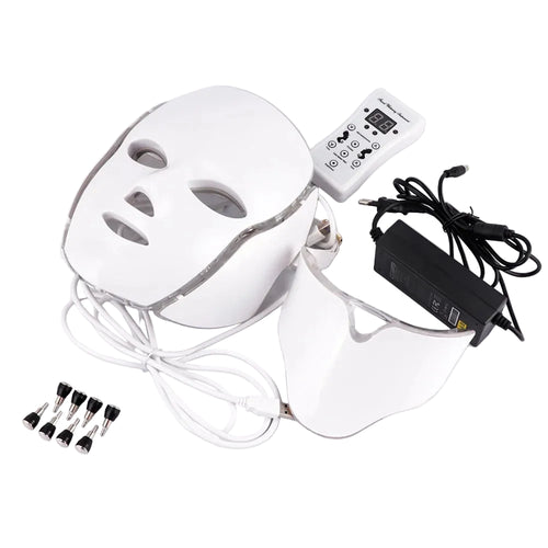 White LED face mask with control panel, power adapter, and attachments on a white background