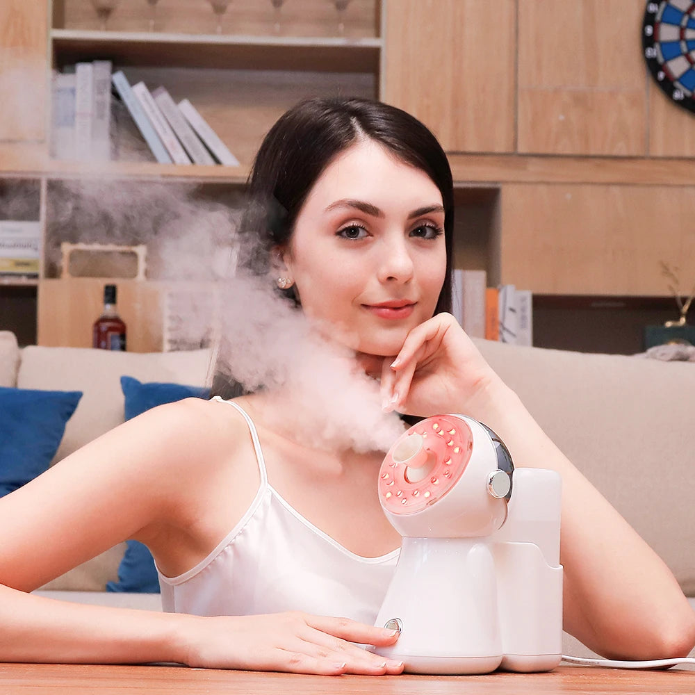 Woman using a handheld steamer with steam coming out, sitting in a living room.
