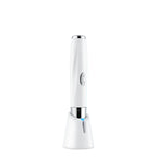 White electric toothbrush with blue light on a white background